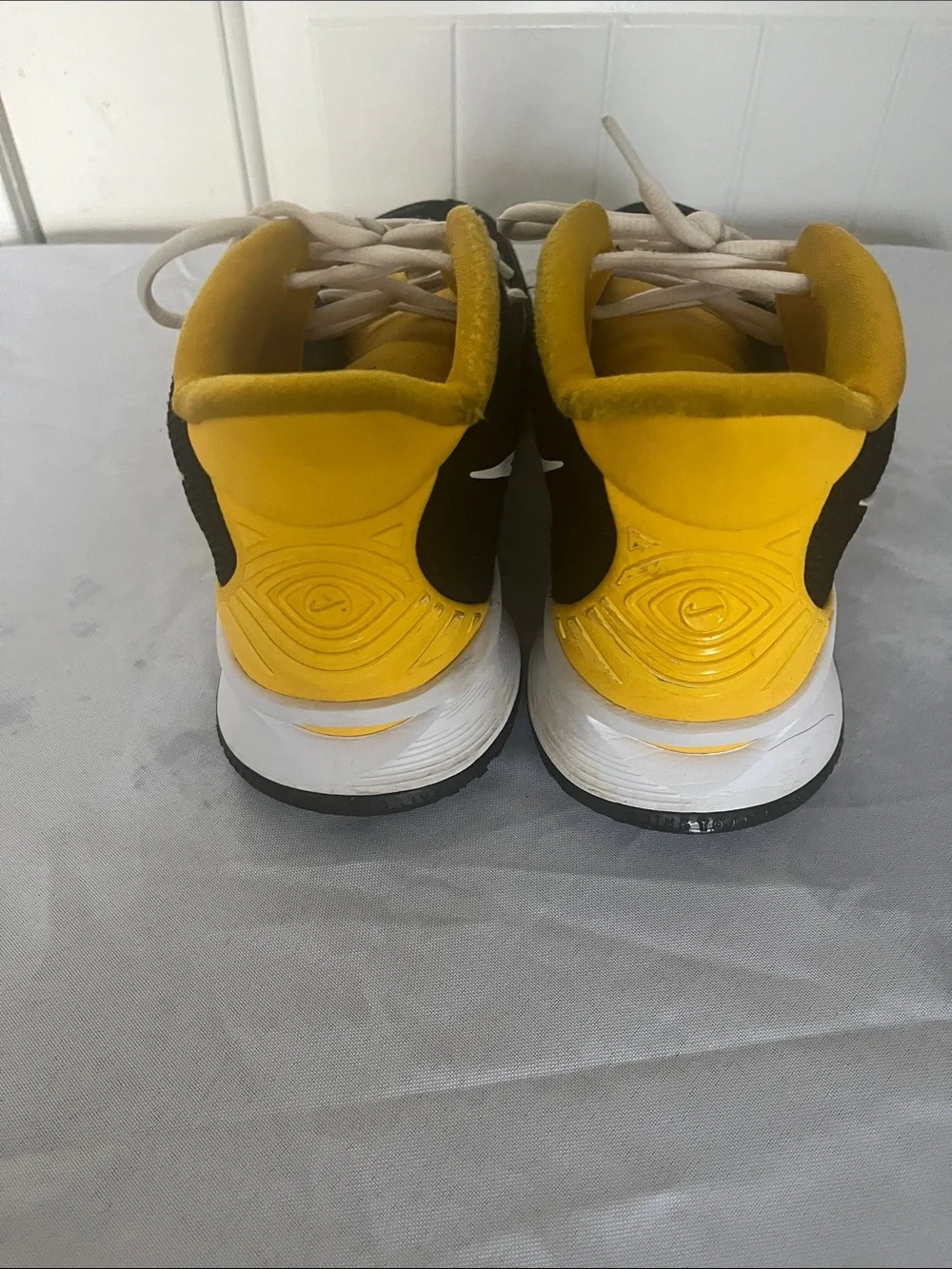Nike Kyrie Black and Yellow High-Top Sneakers